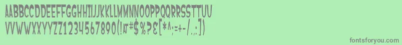SfFerretopia-fontti – harmaat kirjasimet vihreällä taustalla