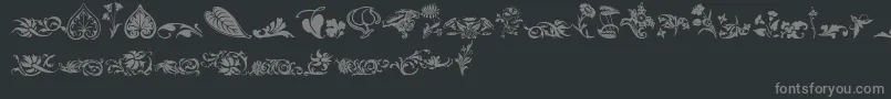 Wwfloralcorner-Schriftart – Graue Schriften auf schwarzem Hintergrund