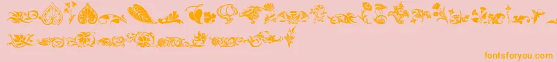 フォントWwfloralcorner – オレンジの文字がピンクの背景にあります。