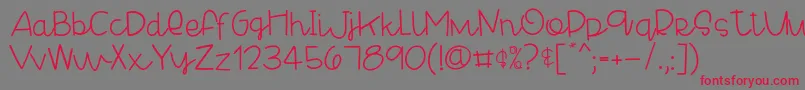 CheesyenchiladaRegular Font – Red Fonts on Gray Background