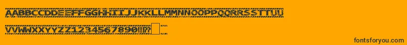 Caution-Schriftart – Schwarze Schriften auf orangefarbenem Hintergrund