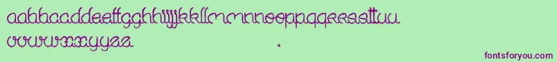 SoldOut Font – Purple Fonts on Green Background