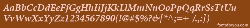 MinionLtBoldItalic-fontti – vaaleanpunaiset fontit ruskealla taustalla