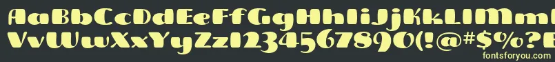 FreddoitcTt Font – Yellow Fonts on Black Background