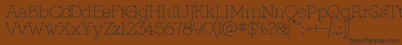 KingthingsSerifiqueUltraLight Font – Black Fonts on Brown Background