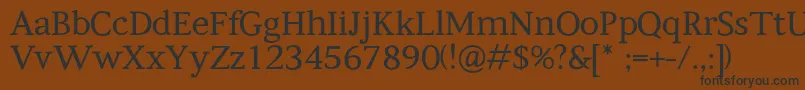 Kompanihhf Font – Black Fonts on Brown Background