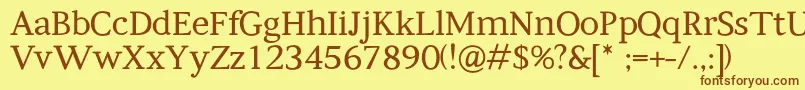 Kompanihhf Font – Brown Fonts on Yellow Background