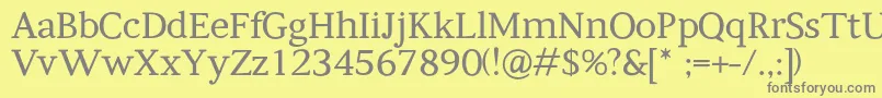 Kompanihhf Font – Gray Fonts on Yellow Background