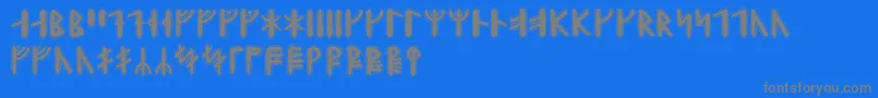 Yggdrasilrunic-Schriftart – Graue Schriften auf blauem Hintergrund