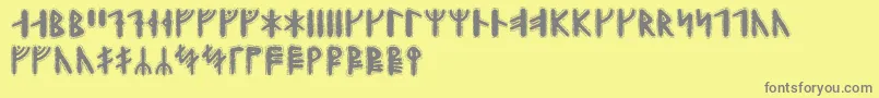 フォントYggdrasilrunic – 黄色の背景に灰色の文字