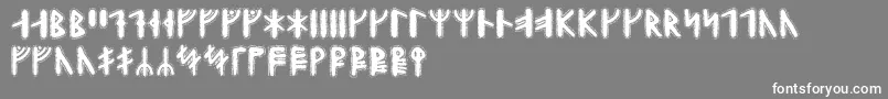 Yggdrasilrunic-Schriftart – Weiße Schriften auf grauem Hintergrund