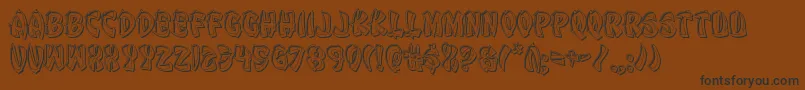 Eggrollengrave-Schriftart – Schwarze Schriften auf braunem Hintergrund