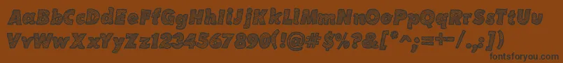 SketchCoursive Font – Black Fonts on Brown Background