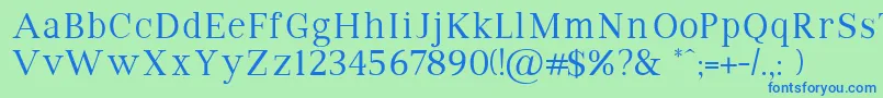 VipromanRegular-fontti – siniset fontit vihreällä taustalla