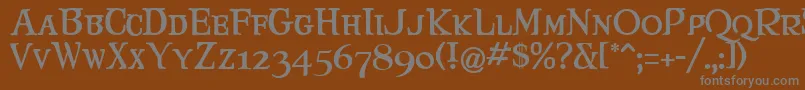 Maryjca Font – Gray Fonts on Brown Background