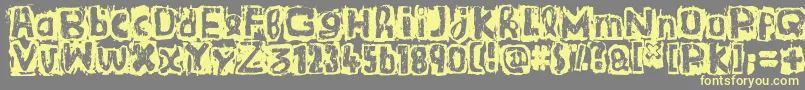 GuignolsBand Font – Yellow Fonts on Gray Background