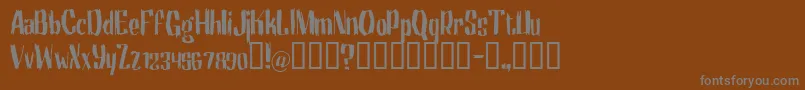 Motrhead Font – Gray Fonts on Brown Background