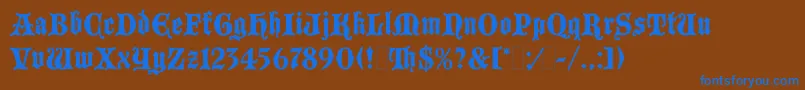 BlackmoorLetPlain.1.0 Font – Blue Fonts on Brown Background
