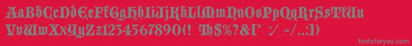 BlackmoorLetPlain.1.0-fontti – harmaat kirjasimet punaisella taustalla