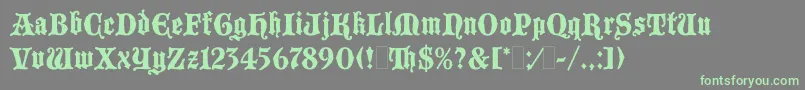 BlackmoorLetPlain.1.0 Font – Green Fonts on Gray Background