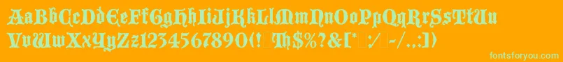 BlackmoorLetPlain.1.0-Schriftart – Grüne Schriften auf orangefarbenem Hintergrund