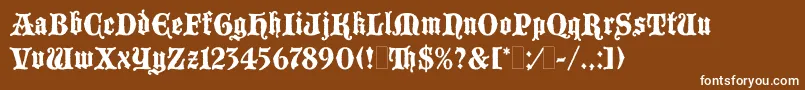 BlackmoorLetPlain.1.0 Font – White Fonts on Brown Background