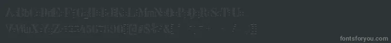 フォントStencix – 黒い背景に灰色の文字