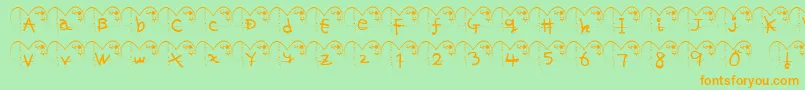 フォントHa ffy – オレンジの文字が緑の背景にあります。