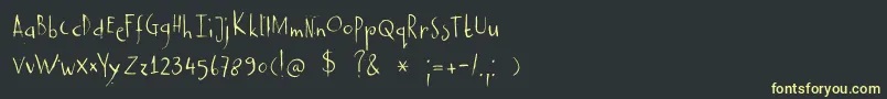 フォントDkCastanea – 黒い背景に黄色の文字