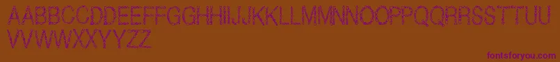 JewelsRegular Font – Purple Fonts on Brown Background