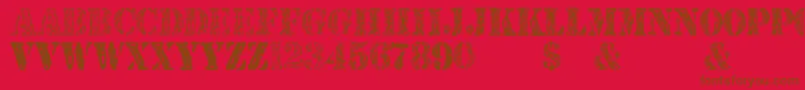 JjstencilTrialVersion-fontti – ruskeat fontit punaisella taustalla