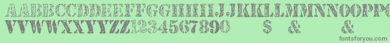 JjstencilTrialVersion Font – Gray Fonts on Green Background