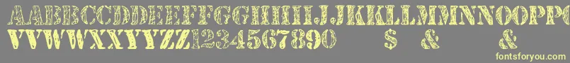 JjstencilTrialVersion Font – Yellow Fonts on Gray Background