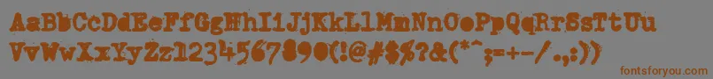 Шрифт PfdumboldtypetwoAlterheavy – коричневые шрифты на сером фоне