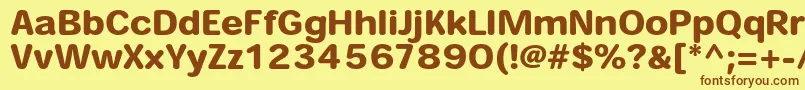 フォントHeiseimarugostdW8 – 茶色の文字が黄色の背景にあります。