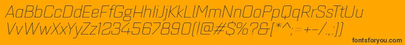 Quarcaextlightitalic-Schriftart – Schwarze Schriften auf orangefarbenem Hintergrund
