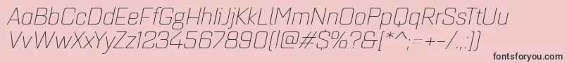 Quarcaextlightitalic-Schriftart – Schwarze Schriften auf rosa Hintergrund