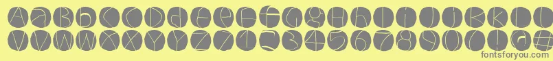 フォントCirculuminvers – 黄色の背景に灰色の文字