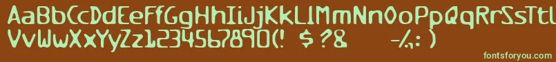 Milesandmilesofverticalsmil-fontti – vihreät fontit ruskealla taustalla
