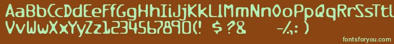 フォントMilesandmilesofverticalsmil – 緑色の文字が茶色の背景にあります。