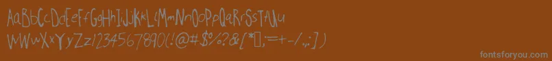 Millweemanuscripting Font – Gray Fonts on Brown Background