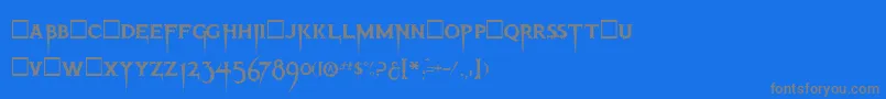 ThrillerRegular-fontti – harmaat kirjasimet sinisellä taustalla