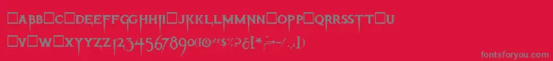 フォントThrillerRegular – 赤い背景に灰色の文字