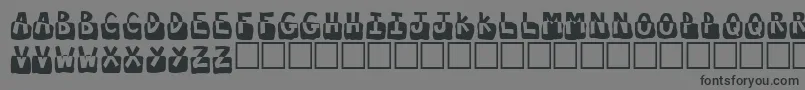 フォントSubmerged – 黒い文字の灰色の背景
