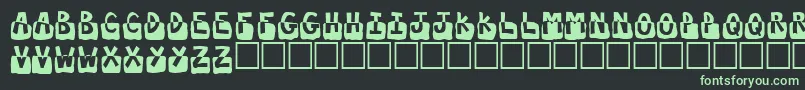 フォントSubmerged – 黒い背景に緑の文字