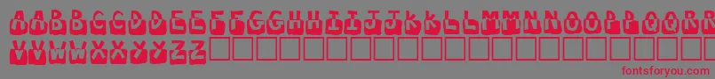 フォントSubmerged – 赤い文字の灰色の背景