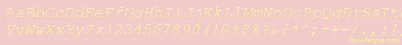 CourierPsItalic-fontti – keltaiset fontit vaaleanpunaisella taustalla