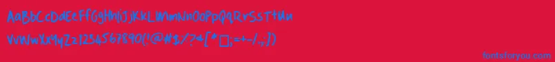 Czcionka Danshandwriting – niebieskie czcionki na czerwonym tle