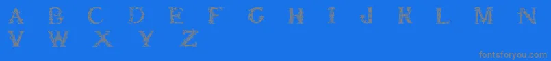 Britishmuseum Font – Gray Fonts on Blue Background