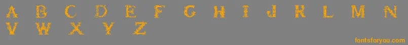 Britishmuseum Font – Orange Fonts on Gray Background
